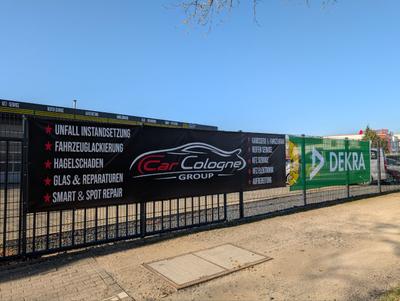 Car Cologne Firmenschild mit DEKRA-Partnerschaft